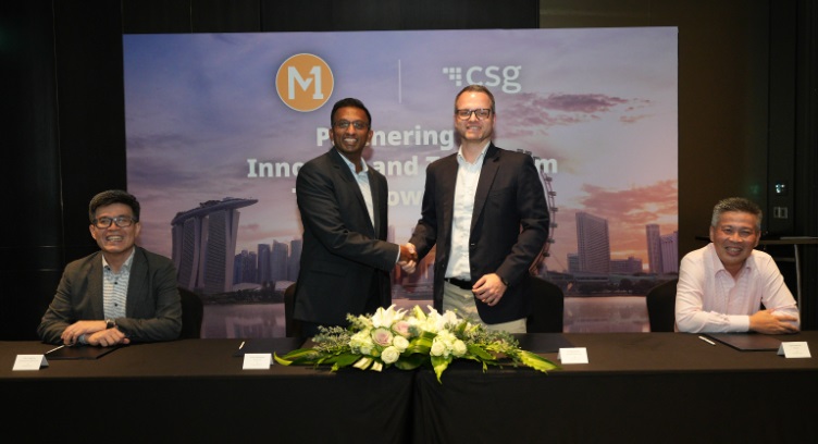 M1 &amp; CSG Signing Ceremony - Partnering to Innovate and Transform Tomorrow&#039;s Telecom. (Photo: Business Wire)